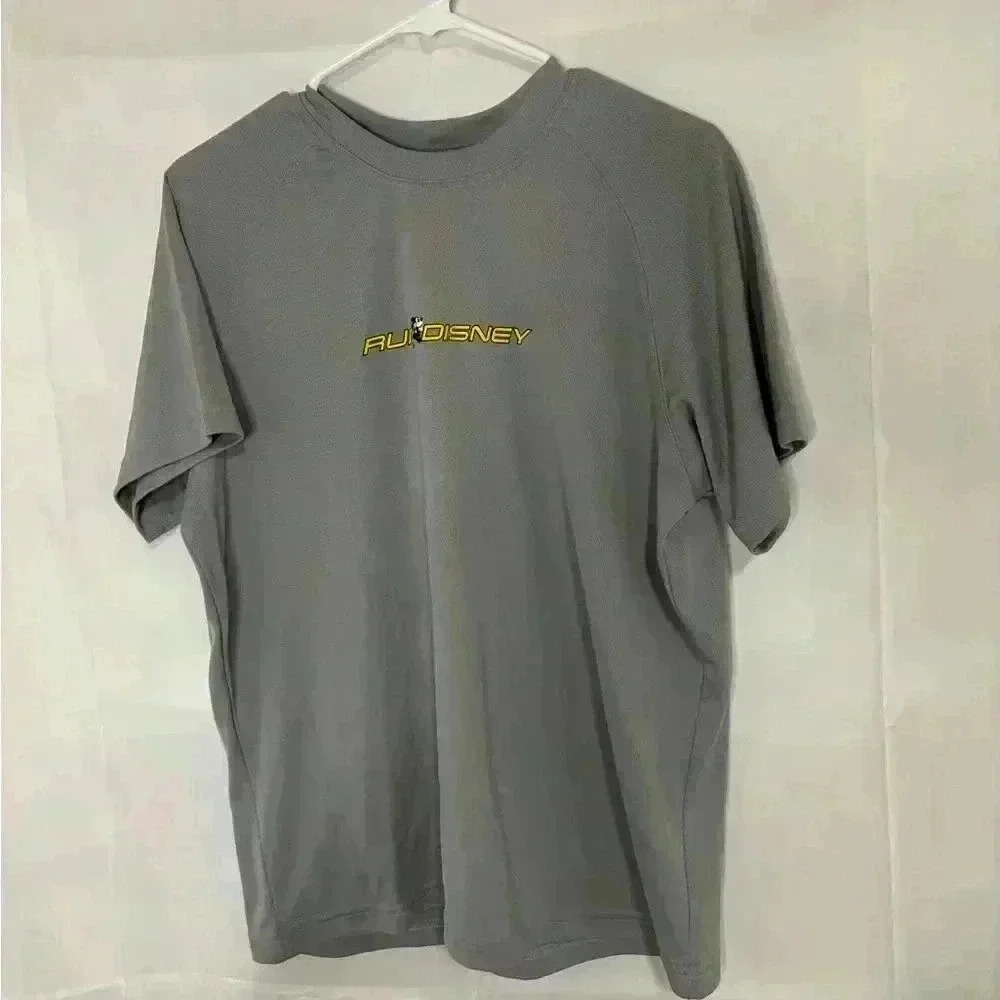 New with tags, men’s size medium run Disney shirt, #B547